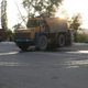 Image for article titled This Is What Happens When A Truck Full Of Crushed Stone Turns Over On A Car